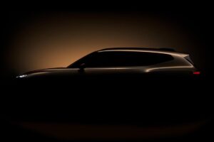 Silhouette teaser du nouveau SUV électrique Cupra développé par Volkswagen Anhui, montrant partiellement ses lignes dynamiques et sa signature lumineuse distinctive avant sa présentation officielle au Salon de Shanghai.