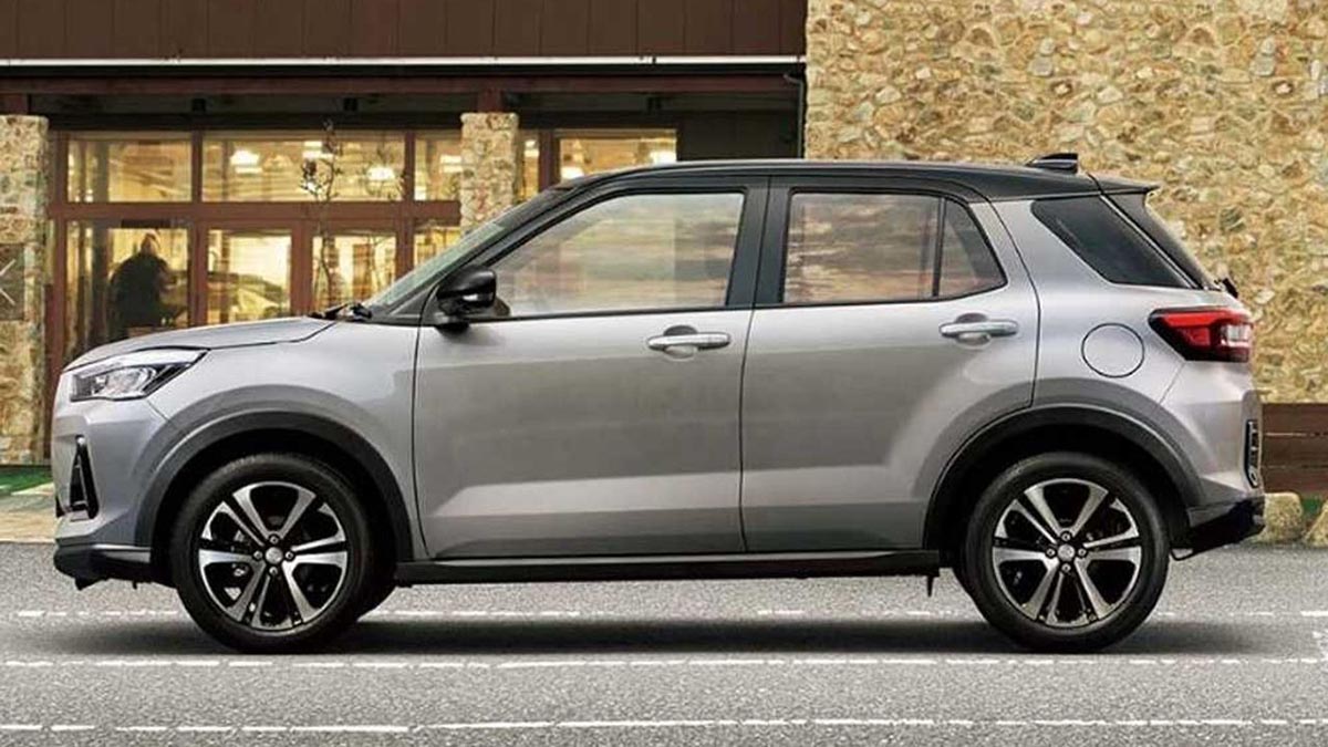 Vue de profil du Subaru REX hybride avec design compact et lignes dynamiques