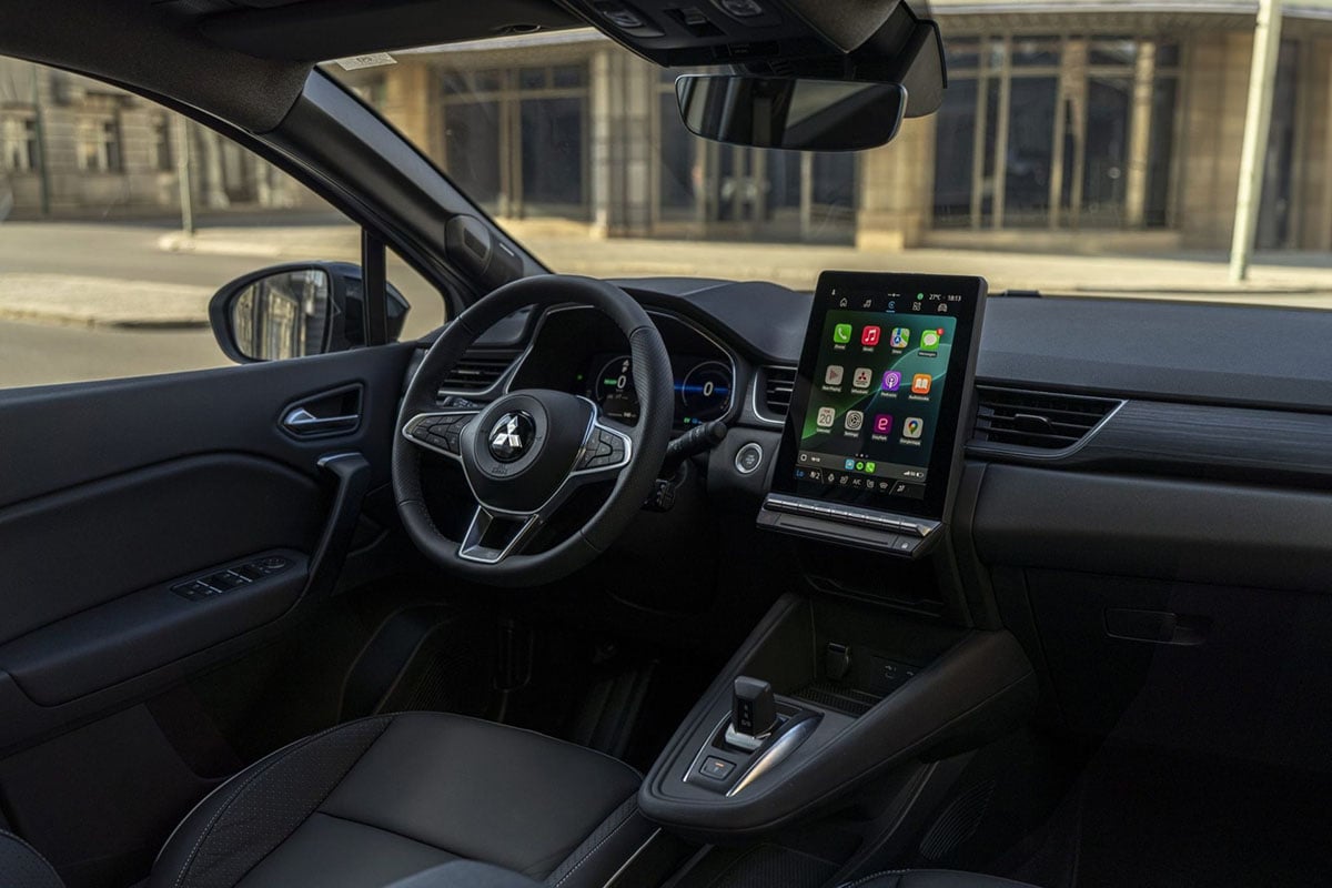 Arrière du Mitsubishi Grandis avec hayon vertical et feux verticaux intégrés
