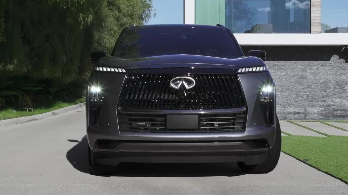 Face avant du QX80 Sport avec feux LED minces et calandre noire anguleuse