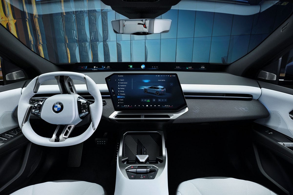 Intérieur du BMW iX3 2025 avec écran Panoramic Vision et interface iDrive 9