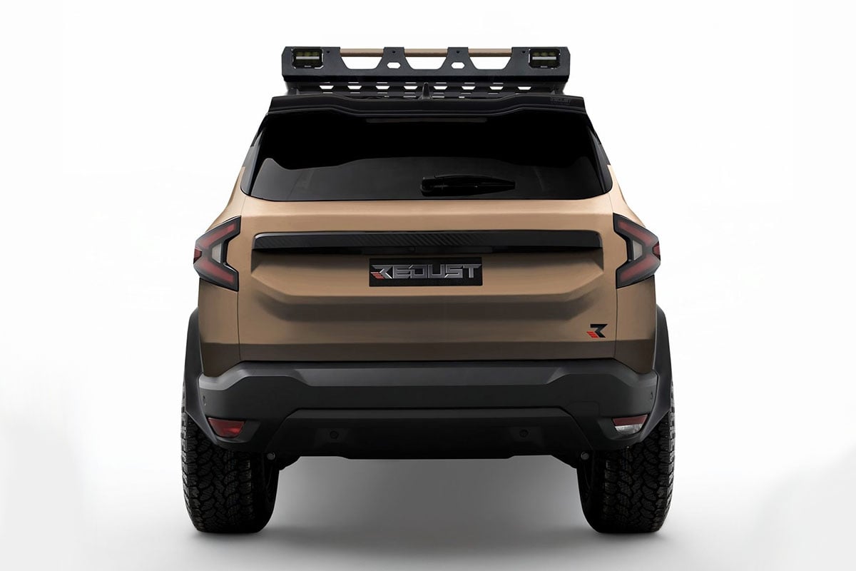 Arrière du Dacia Bigster Redust 2025 avec bouclier renforcé et sorties d’échappement visibles