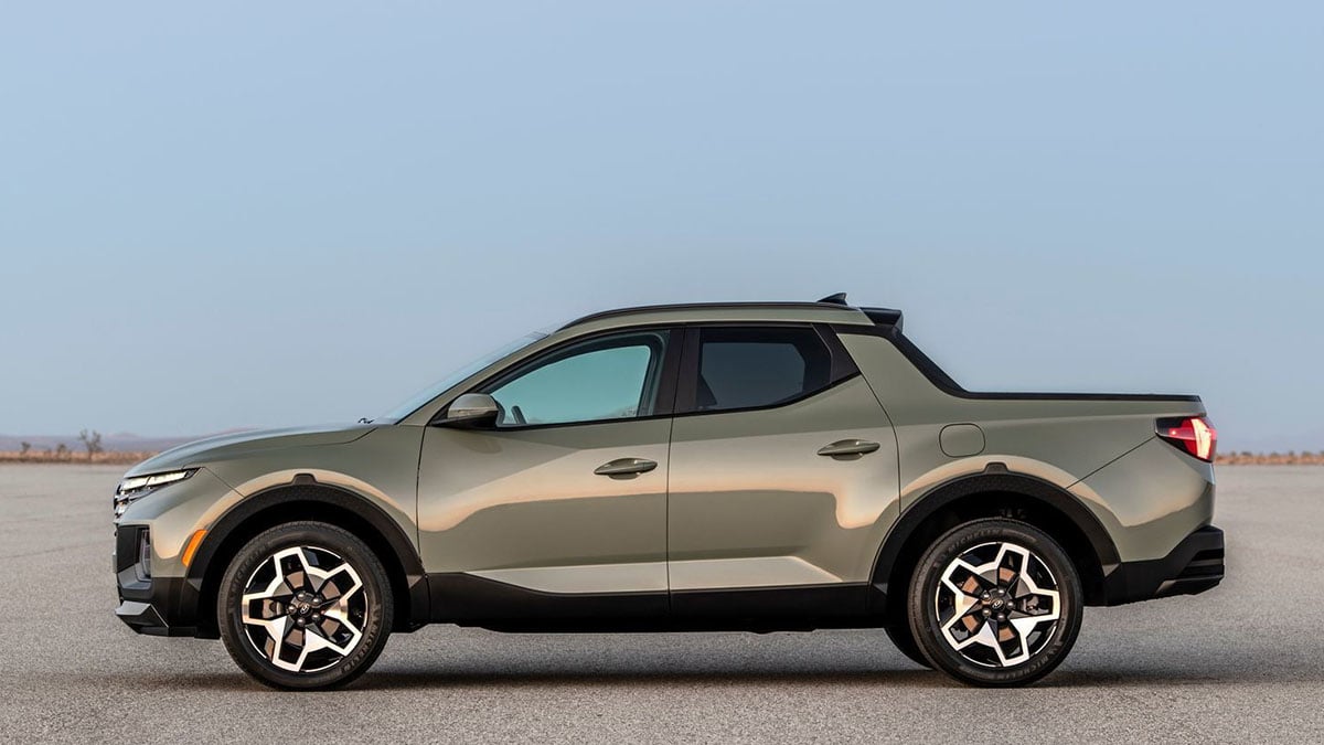  Profil du futur pick-up 4x4 hybride de Hyundai avec silhouette robuste et proportions musclées