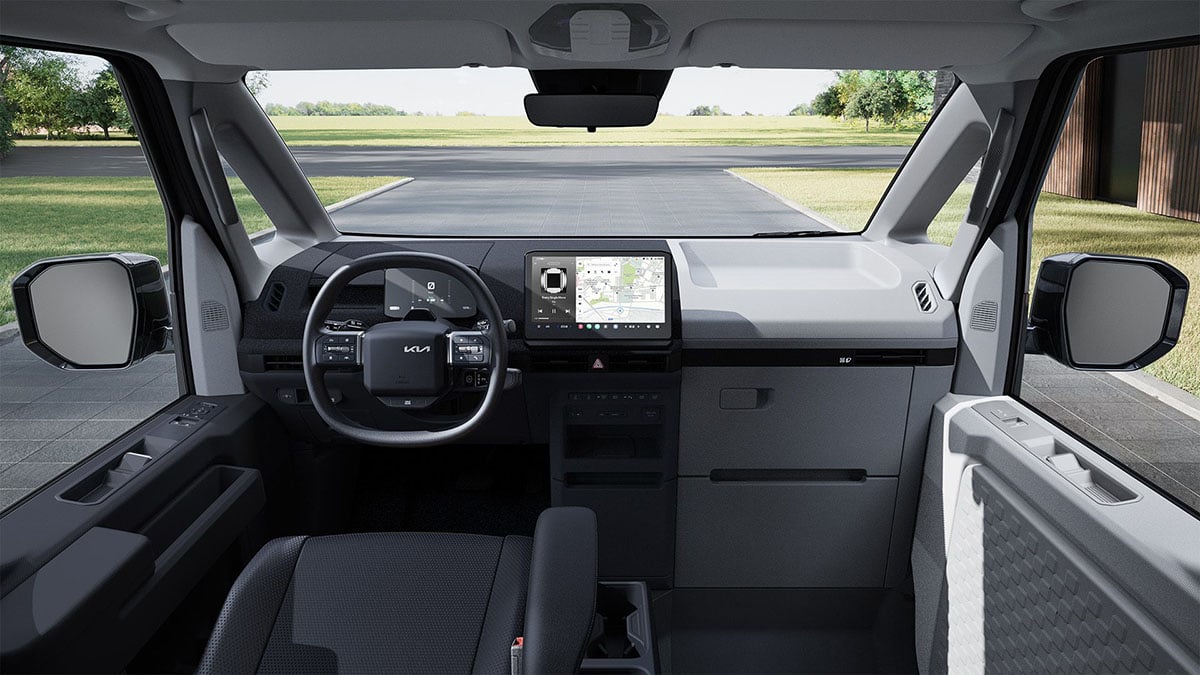 Intérieur du Kia PV5 avec écran numérique central et commandes simplifiées